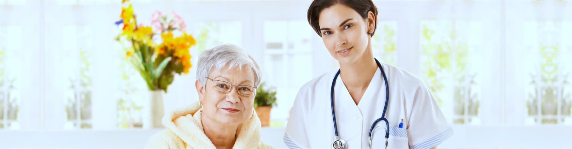 nurse holding senior womans health